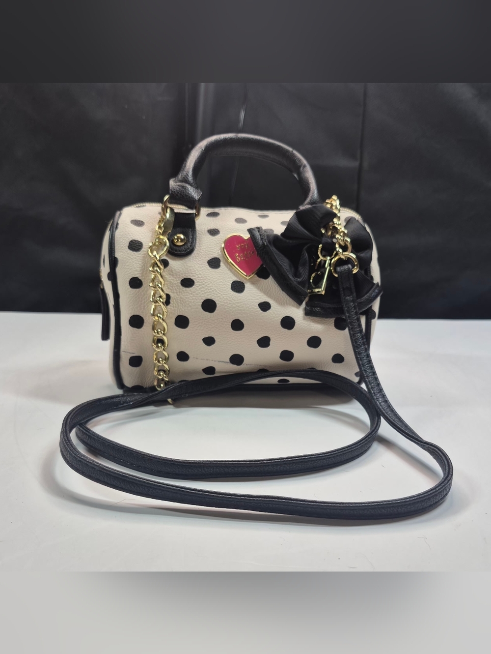 LUV Betsey by Betsey Johnson polka dot mini barrel purse heart bow gold black